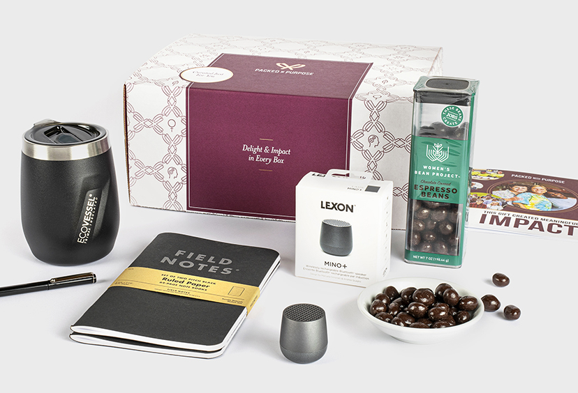 Luxury corporate gift with a portable speaker, to-go mug, notebook, and espresso beans