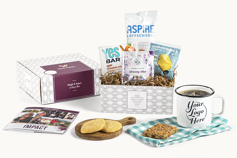 Purposeful Swag Bag gift box containing mug, cookies, crisp bar, coffee, tea, impact booklet
