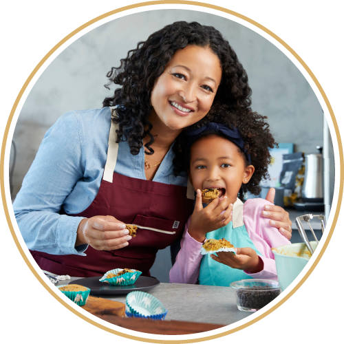 Denise of Partake and her daughter baking cookies together