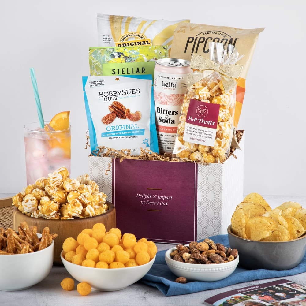 Happy Hour Snacks Gift Happy Hour Snacks gift basket filled with popcorn, pretzel twists, cheese balls, roasted nuts, potato chips, and a can of grapefruit soda