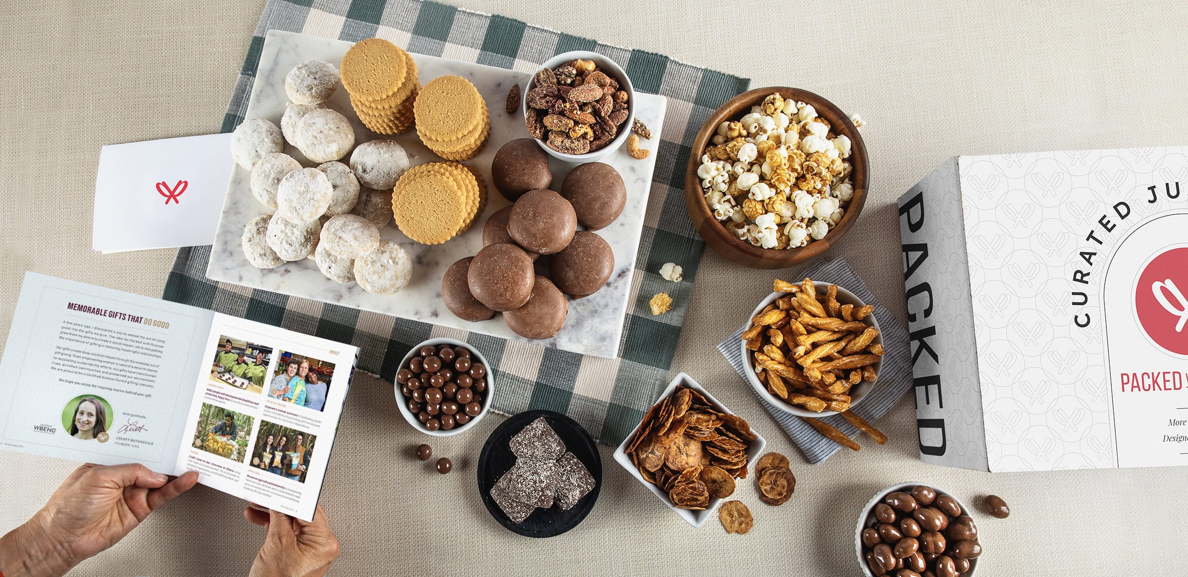 Overhead of a Packed with Purpose gift spread across a desktop