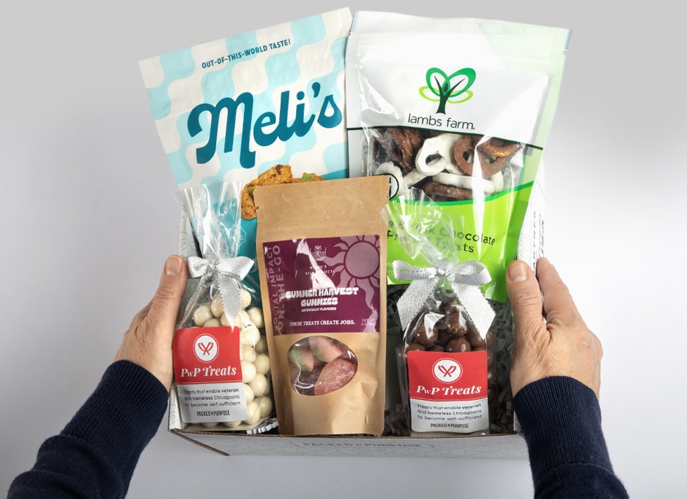 Hands holding an open gift box