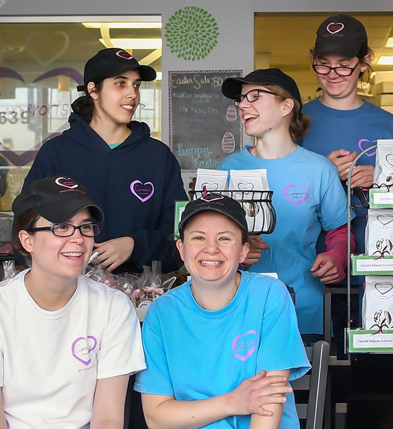 Smiling young workers at Cameron's Coffee and Chocolates