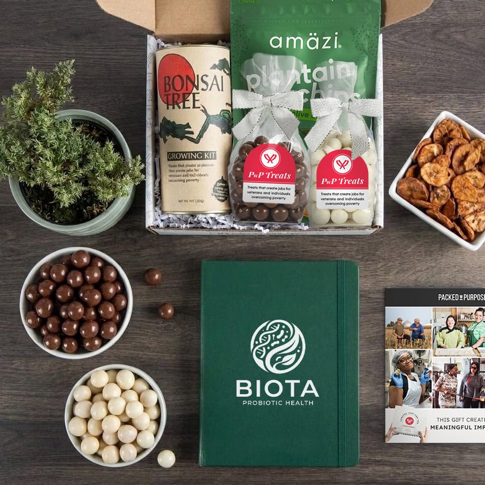 Overhead view of an employee gift with a custom branded journal